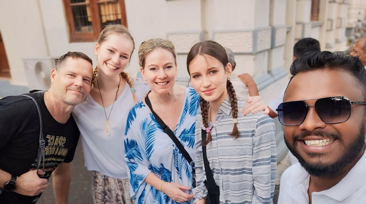 A photo of Milli and her family with Chama in Sri Lanka